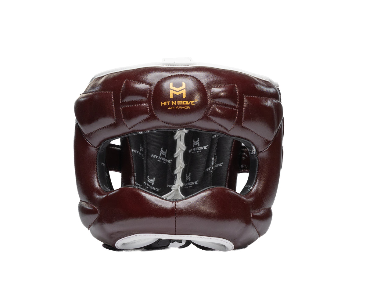 Burgundy HIT'N'MOVE Face Saver boxing headgear with gold logo and padded nose bar, front view